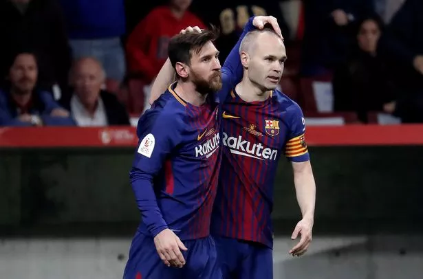 Andres Iniesta and Lionel Messi